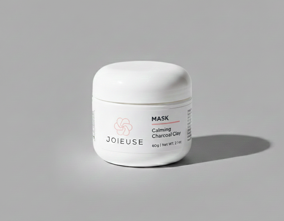 White skincare mask jar with 'JOIEUSE' branding on a gray background