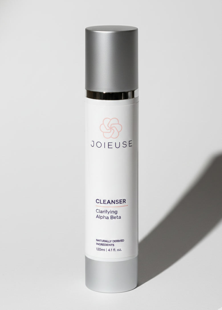 Skincare bottle labeled 'Joieuse' on a light gray background