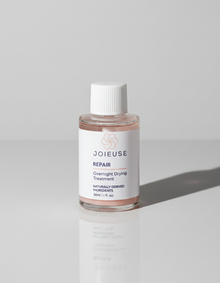 Joieuse skincare bottle on a light gray background